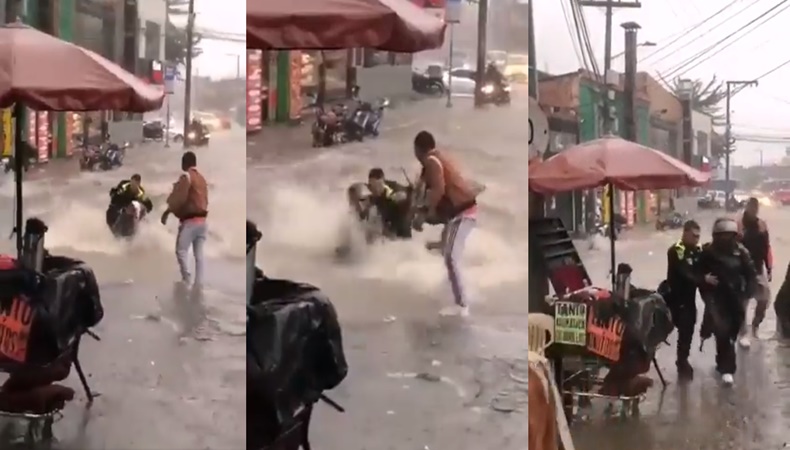 Mujer arrastrada corriente